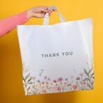 Purple Q Crafts Thank You Bags for Business and Stores 50 Pack 18" W x 18" H Floral Plastic Shopping Bags With Soft Loop Handle - Image 3